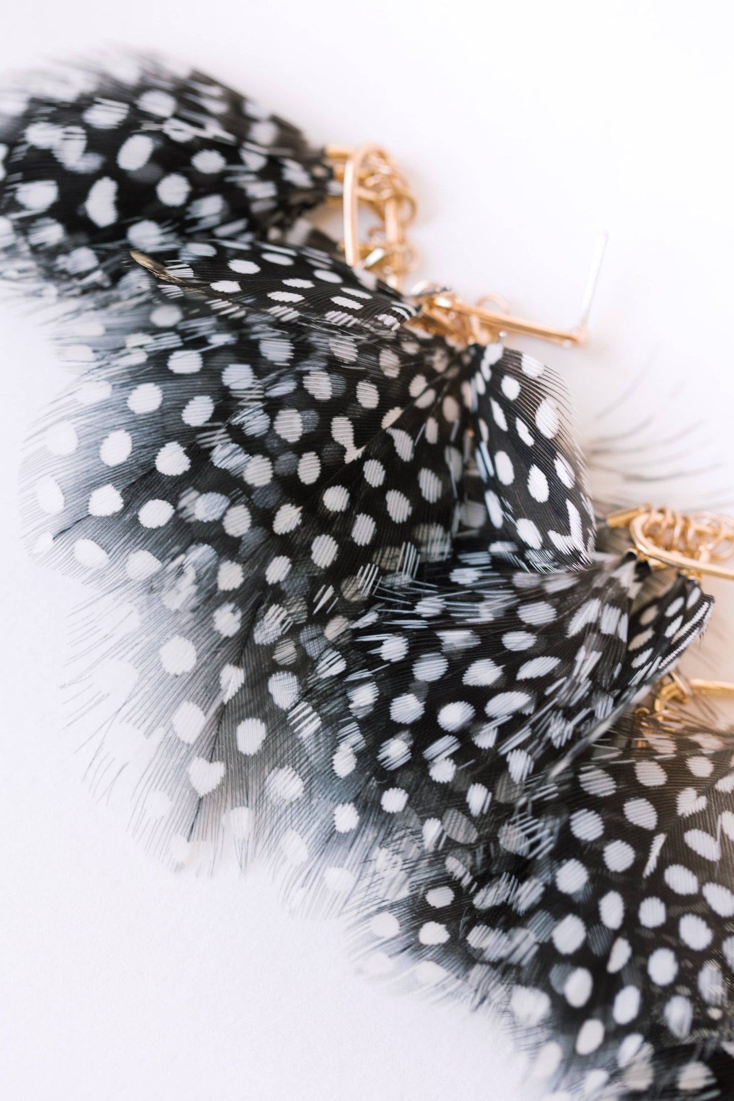 Black and White Spotted Feather Statement Tassel Earrings